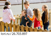 Children playing outdoors. Стоковое фото, фотограф Яков Филимонов / Фотобанк Лори