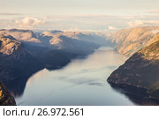 Preikestolen or Prekestolen or Preacher's Pulpit or Pulpit Rock, is a famous tourist attraction in Forsand, Ryfylke, Norway (2017 год). Стоковое фото, фотограф Алексей Ширманов / Фотобанк Лори