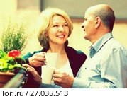 Aged couple drink tea on balcony. Стоковое фото, фотограф Яков Филимонов / Фотобанк Лори
