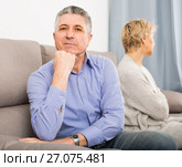 sad mature couple quarreling at home with each other. Стоковое фото, фотограф Яков Филимонов / Фотобанк Лори