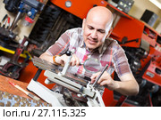 worker making nameboard. Стоковое фото, фотограф Яков Филимонов / Фотобанк Лори