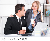 Adult business couple flirting in office. Стоковое фото, фотограф Яков Филимонов / Фотобанк Лори