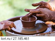 Master class on pottery, a close-up / The picture was taken in Russia, in the city of Orenburg, at the fair of the historical reconstruction festival "Ratny glory." 06/10/2017. Редакционное фото, фотограф Вадим Орлов / Фотобанк Лори