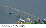 Tromso cantilever road bridge in city, in Troms county. It crosses Tromsoysundet strait between Tromsdalen on mainland and island of Tromsoya, it was opened in 1960 (2016 год). Редакционное фото, фотограф Валерия Попова / Фотобанк Лори
