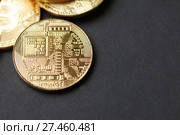 Bitcoin gold coin and chart background. Стоковое фото, фотограф Иван Карпов / Фотобанк Лори