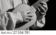 Man playing spanish renaissance instrument vihuela de mano. Стоковое фото, фотограф Дмитрий Черевко / Фотобанк Лори