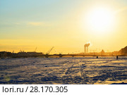 View of the Annunciation bridge from the ice of the Neva river in the evening at sunset (2018 год). Стоковое фото, фотограф Максим Мицун / Фотобанк Лори