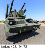 KADAMOVSKIY TRAINING GROUND, ROSTOV REGION, RUSSIA, 26 AUGUST 2017: International military technical forum "ARMY-2017». The Tunguska (SA-19 Grison) is a Russian anti-aircraft weapon armed gun and missile system. Left view. Редакционное фото, фотограф Олег Белов / Фотобанк Лори