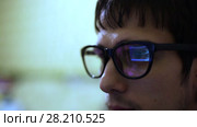 Programmer behind the monitor. Internet Addiction Reflection Hacker Crime Glasses Browsing Late Night Code Cyber Terrorism Password Hacking. Стоковое видео, видеограф Артем Тюгашов / Фотобанк Лори