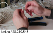 Man crimp of cabling wires. Стоковое видео, видеограф Артем Тюгашов / Фотобанк Лори