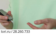 Female hands taking blood sample for sugar testing. Стоковое видео, видеограф Ekaterina Demidova / Фотобанк Лори