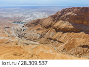 View of surrounding land and the Dead Sea from Masada, an ancient Jewish fortress in the desert of Israel. Стоковое фото, агентство BE&W Photo / Фотобанк Лори