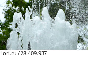 Water stream pouring from fountain in slow motion. Стоковое видео, видеограф Александр Устич / Фотобанк Лори
