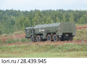 Российский оперативно-тактический ракетный комплекс (ОТРК) "Искандер" (9К720, SS-26 «Stone») в движении на полигоне Алабино, Международный военно-технический форум "Армия-2017" , вид сзади. Редакционное фото, фотограф Малышев Андрей / Фотобанк Лори