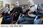 Ufa, Russia - APR 18: Older people in a nursing home. Close-up on April 14, 2018 in Ufa, Russia. Редакционное видео, видеограф Mikhail Erguine / Фотобанк Лори