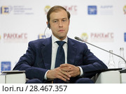 Денис Валентинович Мантуров - министр промышленности и торговли Российской Федерации на Гайдаровском форуме 2018. Редакционное фото, фотограф Игорь Долгов / Фотобанк Лори