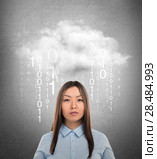 Young business woman or system administrator under cloud with digital rain. Cloud technology concept. Стоковое фото, агентство Ingram Publishing / Фотобанк Лори