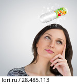 Healthy life concept. Woman with vitamins overhead. Стоковое фото, фотограф Kirill Kedrinskiy / Ingram Publishing / Фотобанк Лори