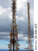 Telecommunications tower telephony repeaters in Menorca Pico del Toro. Стоковое фото, фотограф Tono Balaguer / Ingram Publishing / Фотобанк Лори