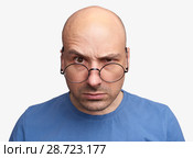 angry bald man isolated. Стоковое фото, фотограф Александр Лычагин / Фотобанк Лори