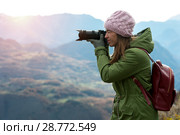 Woman in autumn clothes with camera. Стоковое фото, фотограф Pavel Biryukov / Фотобанк Лори
