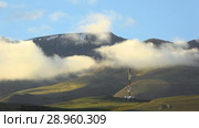 Таймлапс, пейзаж Курайского горного хребта с ретранслятором / Timelaps of Kuray mountain range with repeater fnd running clouds on blue sky in evening time. Altai Mountains. Стоковое видео, видеограф Сергей Пристяжнюк (Serg Zastavkin) / Фотобанк Лори