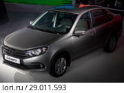 Автомобиль Lada Granta во время презентации новых моделей Lada семейства Granta в новой ИКС-стилистике, Vesta Cross, XRAY Cross и Vesta Sport на московском международном автомобильном салоне (ММАС – 2018) в МВЦ "Крокус Экспо", Россия. Редакционное фото, фотограф Николай Винокуров / Фотобанк Лори