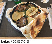 Запеченное мясо с картофелем под лавашем. Стоковое фото, фотограф Куприянова Ольга / Фотобанк Лори