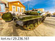 Russia, Samara, May 2018: New military modified russian army main battle tank T-72B3M in green camouflage at the city street. Редакционное фото, фотограф Акиньшин Владимир / Фотобанк Лори