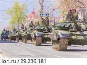 Russia, Samara, May 2018: New military modified russian army main battle tank T-72B3M in green camouflage at the city street. Редакционное фото, фотограф Акиньшин Владимир / Фотобанк Лори