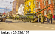 Russia, Samara, May 2018: New military modified russian army main battle tank T-72B3M in green camouflage at the city street. Редакционное фото, фотограф Акиньшин Владимир / Фотобанк Лори