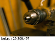 Detail of the lathe - clamping chuck - close up on a blurred background. Стоковое фото, фотограф Евгений Харитонов / Фотобанк Лори