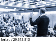 Sturtup expert giving talk at business event workshop. Стоковое фото, фотограф Matej Kastelic / Фотобанк Лори