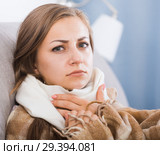 Sick girl with scarf on neck. Стоковое фото, фотограф Яков Филимонов / Фотобанк Лори