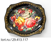 Zhostovo painting, old Russian folk handicraft of painting on metal trays, which still exists in village of Zhostovo. Tray with bright flowers (2018 год). Редакционное фото, фотограф Валерия Попова / Фотобанк Лори