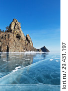 Lake Baikal in winter. View from the ice on the famous cliffs of the Big and Small Belltowers (Kolokolny) - a natural landmark of the western coast of the lake. Стоковое фото, фотограф Виктория Катьянова / Фотобанк Лори