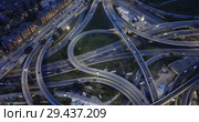 Aerial view of lighted highway road junctions at night. Стоковое видео, видеограф Яков Филимонов / Фотобанк Лори