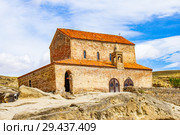Beautuful View to Ancient Orthodox Church in mount in antique cave city Uplistsikhe. The Uplistsikhe 9th-10th century three-nave basilica and vale of Mtkvari river, Shida Kartli, Gori, Georgia. Стоковое фото, фотограф Алексей Ширманов / Фотобанк Лори