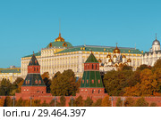 The Grand Kremlin Palace and Kremlin wall in sunny semmer day in Moscow - Capital of Russia. Стоковое фото, фотограф Николай Чутчиков / Фотобанк Лори