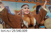 Portrait of young woman dancer in national clothing indigenous Kamchatka decorated with red fox (2018 год). Редакционное видео, видеограф А. А. Пирагис / Фотобанк Лори