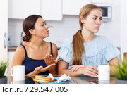 Woman apologizing from offended friend. Стоковое фото, фотограф Яков Филимонов / Фотобанк Лори