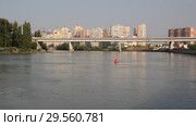 Река Кубань, Тургеневский мост и набережная с современными домами. Краснодар, Россия (2018 год). Редакционное видео, видеограф Олег Хархан / Фотобанк Лори