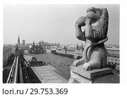 Химера на Спасской башне Московского Кремля. Стоковое фото, фотограф Борис Кавашкин / Фотобанк Лори