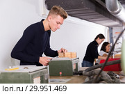 Young architect making architectural model. Стоковое фото, фотограф Яков Филимонов / Фотобанк Лори