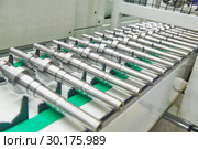 robotized automated conveyor for detail supply into cnc machining center. Стоковое фото, фотограф Дмитрий Калиновский / Фотобанк Лори