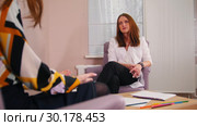 Reception at the psychologist in the clinic. The doctor listening to the clients problems. Стоковое видео, видеограф Константин Шишкин / Фотобанк Лори