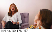 Reception at the psychologist in the clinic. The doctor having a conversation with a patient. Стоковое видео, видеограф Константин Шишкин / Фотобанк Лори