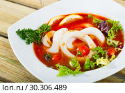 Tomato soup with squid and greens. Стоковое фото, фотограф Яков Филимонов / Фотобанк Лори