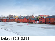 A view of old wooden barns in the Porvoo Old Town, Finland (2019 год). Редакционное фото, фотограф Ольга Визави / Фотобанк Лори