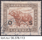 Африканский буйвол (Syncerus caffer), надпечатка OS. Почтовая марка Либерии 1923 года. Редакционная иллюстрация, иллюстратор александр афанасьев / Фотобанк Лори